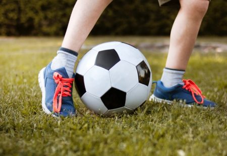 boy-playing-with-soccer-ball-3074920