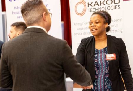 Female shaking hands with male at the Celebrate Chesterfield Business Expo