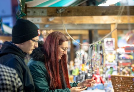 Man and woman looking at items at items at Chesterfield Market