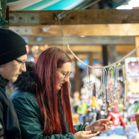 Man and woman looking at items at items at Chesterfield Market