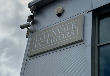 Exterior of warehouse building with Ellenvale Interiors sign