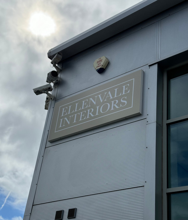 Exterior of warehouse building with Ellenvale Interiors sign