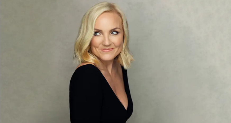 Kerry Ellis in a black top smiling