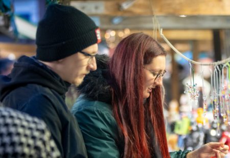 Man and woman looking at items at items at Chesterfield Market