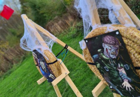 Archery stands with zombie pictures on