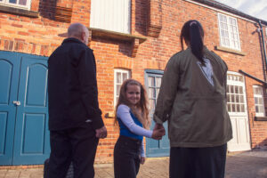 Family outside Air B&B