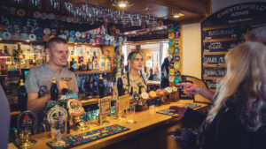 Staff serving beer at Chesterfield Arms