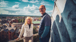 Couple on a tour of the Crooked Spire