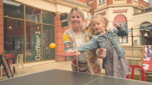 Mum and kid playing table tennis at Vicar Lane