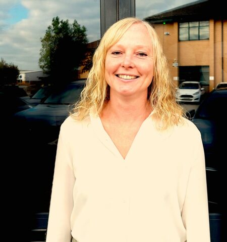 Carrie Booth stood in front of office entrance