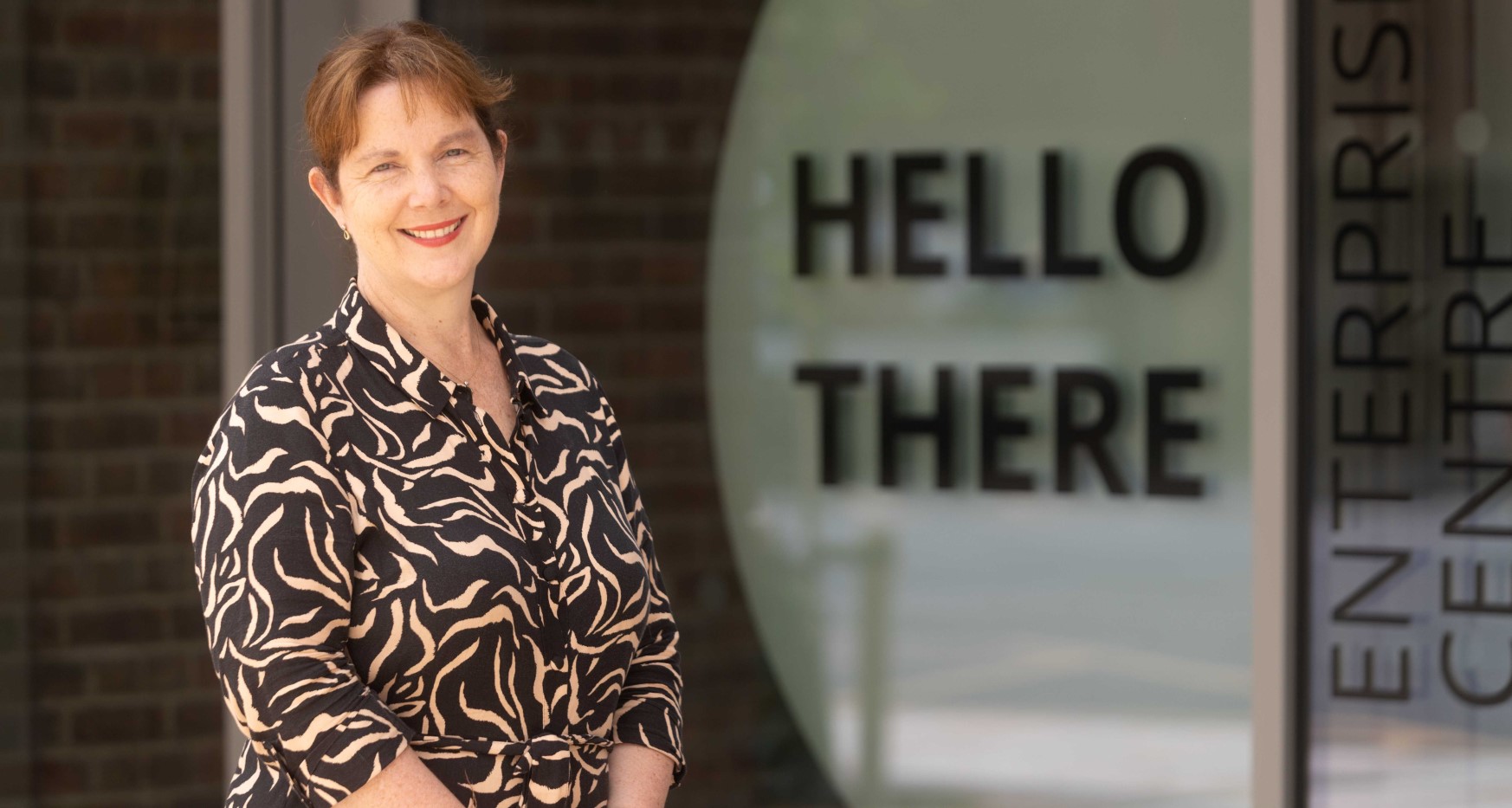 Mayor Claire Ward stood in front of office entrance