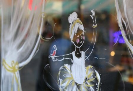 Image of a shop window decorated for the the Robin's Lost Letters Winter Trail