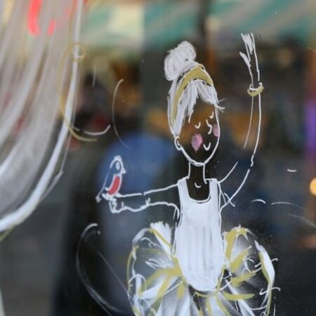 Image of a shop window decorated for the the Robin's Lost Letters Winter Trail