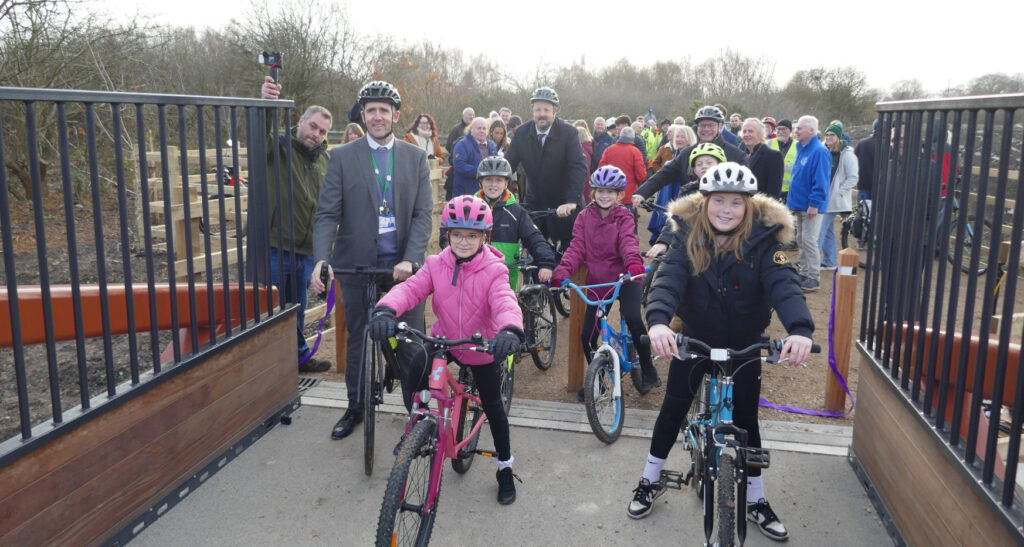 Children from Hollingwood Primary School with their headteacher, Mr Chris Stewart, Toby Perkins MP and Ivan Fomin