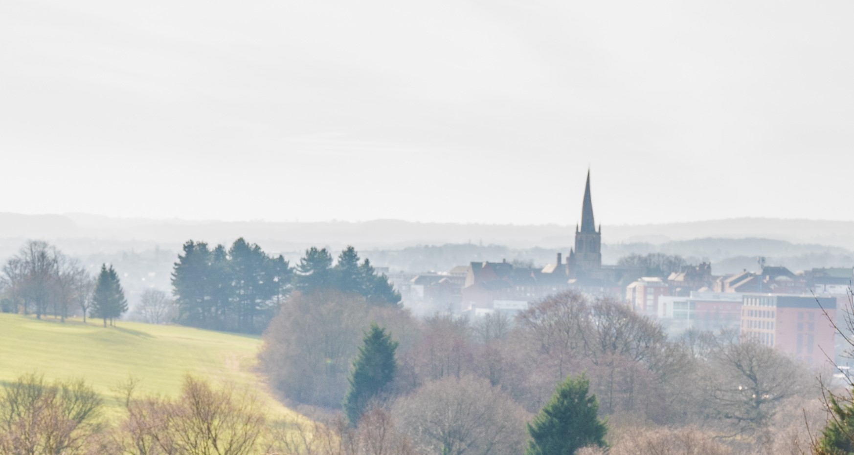 View of Chesterfield showing the crooked spire and Waterside office building in the distance